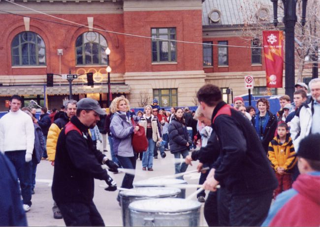 trash-can drummers in front of Gateway Plaza